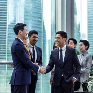 Firefly successful Singaporean group of 8 business partners shaking hands and being happy in a Singa (1)
